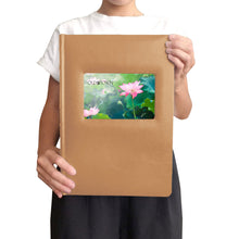 Load image into Gallery viewer, Woman holding leather album to show scale.
